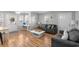 Inviting living room featuring comfortable seating, beach-themed decor, and hardwood floors at 6001 - 1820A S Kings Hwy., Myrtle Beach, SC 29575