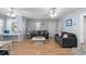 Cozy living room featuring comfortable seating, beach-themed decor, and hardwood floors at 6001 - 1820A S Kings Hwy., Myrtle Beach, SC 29575