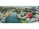 Aerial view of condo community near the beach with a pond and pool at 601 Hillside Dr. N # 302, North Myrtle Beach, SC 29582