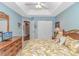 Comfortable bedroom featuring a dresser, closet, and TV for ultimate relaxation at 601 Hillside Dr. N # 302, North Myrtle Beach, SC 29582