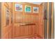 Elevator interior with wooden paneling and artwork for a smooth ride at 601 Hillside Dr. N # 302, North Myrtle Beach, SC 29582