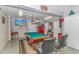 Entertainment room featuring a pool table, seating, and a mounted TV at 601 Hillside Dr. N # 302, North Myrtle Beach, SC 29582