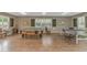 Recreation room with pool table, ping pong table, and bright natural light at 601 Hillside Dr. N # 302, North Myrtle Beach, SC 29582