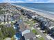 Stunning aerial view of condo located on a sandy beach and near a main road at 612 N Ocean Blvd. # 103, Surfside Beach, SC 29575