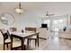 Inviting living space with wood floors, a dining table, and a comfortable sofa set for relaxing and entertaining guests at 612 N Ocean Blvd. # 103, Surfside Beach, SC 29575