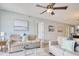 Comfortable living room with hardwood flooring, ceiling fan, and modern decor at 612 N Ocean Blvd. # 103, Surfside Beach, SC 29575