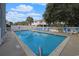 Large, inviting community pool with ample seating and beautiful surrounding landscape at 612 N Ocean Blvd. # 103, Surfside Beach, SC 29575