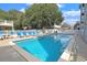 Beautiful community pool featuring sparkling blue water and comfortable lounge chairs at 612 N Ocean Blvd. # 103, Surfside Beach, SC 29575