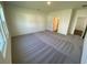 Spacious bedroom with neutral carpet and light-filled windows at 620 Muster Field Ct., Conway, SC 29526