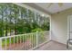 Private balcony showcasing a serene view of lush trees and greenery at 6253 Catalina Dr. # 433, North Myrtle Beach, SC 29582