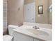 Bright bathroom featuring a vanity, toilet, and towel rack at 6253 Catalina Dr. # 433, North Myrtle Beach, SC 29582