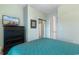 Comfortable bedroom with a black dresser and a mounted television at 6253 Catalina Dr. # 433, North Myrtle Beach, SC 29582