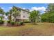 Exterior of a multi-story residential building with well-maintained landscaping at 6253 Catalina Dr. # 433, North Myrtle Beach, SC 29582