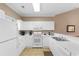 Well-lit kitchen with white appliances and ample counter space at 6253 Catalina Dr. # 433, North Myrtle Beach, SC 29582