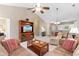 Open-concept living area features comfortable sofas, a media center, and seamless access to dining and kitchen areas at 6253 Catalina Dr. # 433, North Myrtle Beach, SC 29582