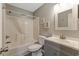 Bathroom with tub shower, stylish vanity, and neutral tones, creating a clean and functional space at 637 Waterway Village Blvd. # 13C, Myrtle Beach, SC 29579
