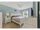 Comfortable bedroom with a queen size bed, a view of the golf course, and plenty of natural light at 637 Waterway Village Blvd. # 13C, Myrtle Beach, SC 29579