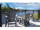 Inviting deck with patio furniture overlooking a serene waterway, perfect for relaxation at 637 Waterway Village Blvd. # 13C, Myrtle Beach, SC 29579