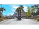 Beautiful Waterway Village entrance with a decorative gate and well-maintained landscaping at 637 Waterway Village Blvd. # 13C, Myrtle Beach, SC 29579