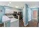 Functional kitchen featuring modern appliances, white cabinetry, and easy access to the outdoor area at 637 Waterway Village Blvd. # 13C, Myrtle Beach, SC 29579