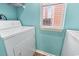 Laundry room with washer, dryer, and a window providing natural light, making chores more pleasant at 637 Waterway Village Blvd. # 13C, Myrtle Beach, SC 29579