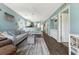Spacious living room with an open floor plan, with direct access to the kitchen and dining area at 637 Waterway Village Blvd. # 13C, Myrtle Beach, SC 29579