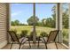 Relaxing screened patio features tile flooring and beautiful views of the community golf course at 637 Waterway Village Blvd. # 13C, Myrtle Beach, SC 29579
