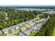 Scenic aerial view of a peaceful neighborhood surrounded by lush greenery and mature trees at 6478 Royal Pine Dr., Myrtle Beach, SC 29588