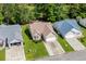 Ariel view of a charming home with manicured lawn and mature trees at 6478 Royal Pine Dr., Myrtle Beach, SC 29588