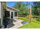Covered patio with outdoor seating, and views of the backyard at 6478 Royal Pine Dr., Myrtle Beach, SC 29588