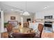 Eat-in kitchen includes stainless appliances, open access, and modern lighting at 6478 Royal Pine Dr., Myrtle Beach, SC 29588