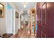 Inviting entryway featuring hardwood floors and a view into the living area at 6478 Royal Pine Dr., Myrtle Beach, SC 29588