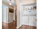 Bright laundry area with updated appliances and plenty of storage space in a well-lit closet at 6478 Royal Pine Dr., Myrtle Beach, SC 29588