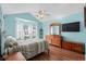 Bright main bedroom with a vaulted ceiling, bay window, and wood-look floors at 6478 Royal Pine Dr., Myrtle Beach, SC 29588