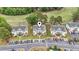 An aerial view of condos overlooking lush greenery and parking at 664 Tupelo Ln. # 8A, Longs, SC 29568