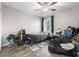 Bedroom featuring a ceiling fan, hardwood flooring, and a comfortable bed at 664 Tupelo Ln. # 8A, Longs, SC 29568