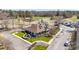 Aerial view of the golf clubhouse with flags out front at 664 Tupelo Ln. # 8A, Longs, SC 29568