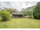A well-maintained lawn is featured at the back of this house at 704 N North Congdon St., Georgetown, SC 29440