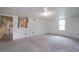 Basement featuring wood paneling, a window, and neutral colored carpet at 704 N North Congdon St., Georgetown, SC 29440
