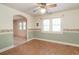 Dining room with natural light, ceiling fan, and wood-look floors at 704 N North Congdon St., Georgetown, SC 29440