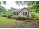 Cozy home featuring a well-manicured lawn and classic architectural details at 704 N North Congdon St., Georgetown, SC 29440