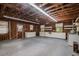 Spacious garage featuring ample storage, bare stud walls, and multiple windows at 704 N North Congdon St., Georgetown, SC 29440