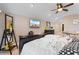 Bright and airy bedroom with bed and beach themed wall decor at 7253 Seville Dr., Myrtle Beach, SC 29572