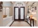Elegant foyer featuring detailed double doors and a decorative console table at 7253 Seville Dr., Myrtle Beach, SC 29572