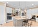 Gourmet kitchen with stainless steel appliances, granite countertops, and a large island at 7253 Seville Dr., Myrtle Beach, SC 29572