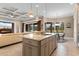 Spacious kitchen with granite island overlooks breakfast nook and living room, great for entertaining guests at 7253 Seville Dr., Myrtle Beach, SC 29572