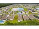 Aerial view of the home showcasing the backyard, neighborhood, and community pond at 739 Harrison Mill St., Myrtle Beach, SC 29579