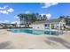 Community pool with ample seating, changing rooms, and a nearby playground at 739 Harrison Mill St., Myrtle Beach, SC 29579