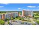 Picturesque aerial view of resort with parking, lush gardens, and waterways offering a tranquil setting at 8121 Amalfi Pl. # 7-604, Myrtle Beach, SC 29572