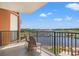 Balcony view showcasing marina with seating, beautiful sky, and overlooking the scenic waterfront at 8121 Amalfi Pl. # 7-604, Myrtle Beach, SC 29572
